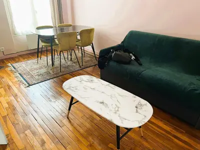 Coin salon dans l'établissement Magnifique appartement Paris