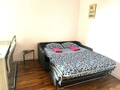 Un ou plusieurs lits dans un hébergement de l'établissement Magnifique appartement Paris