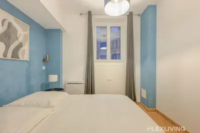 Un ou plusieurs lits dans un hébergement de l'établissement Flexliving - room - Neuilly-sur-Seine