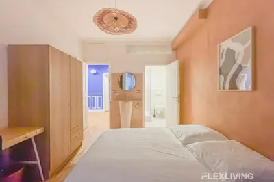 Un ou plusieurs lits dans un hébergement de l'établissement Flexliving - room - Neuilly-sur-Seine