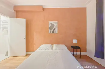 Un ou plusieurs lits dans un hébergement de l'établissement Flexliving - room - Neuilly-sur-Seine