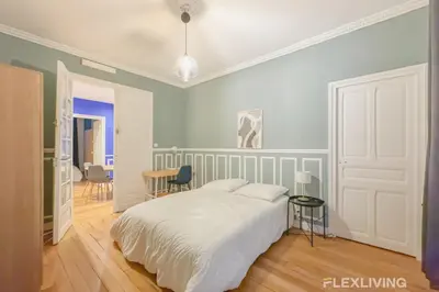 Un ou plusieurs lits dans un hébergement de l'établissement Flexliving - room - Neuilly-sur-Seine
