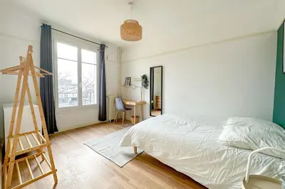 Un ou plusieurs lits dans un hébergement de l'établissement Flexliving - room - Entrepreneur
