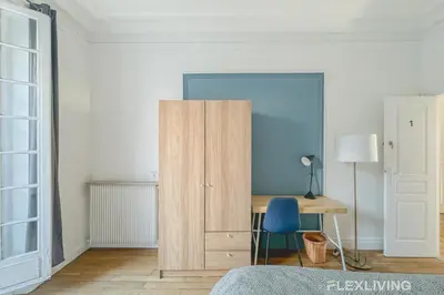 Un ou plusieurs lits dans un hébergement de l'établissement Flexliving - room - Felix Faure