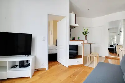 Télévision ou salle de divertissement dans l'établissement GuestReady - Neat stay near the wall of Love