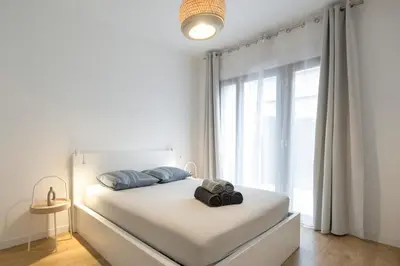 Un ou plusieurs lits dans un hébergement de l'établissement Appartement 3p proche du Stade de France