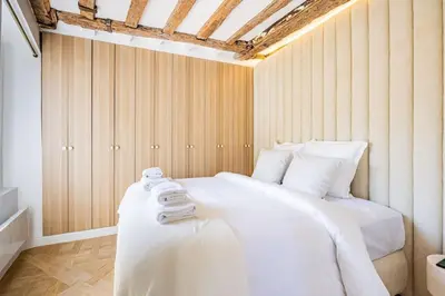 Un ou plusieurs lits dans un hébergement de l'établissement 2bedrooms Sacrée cœur Place du Tertre Montmartre