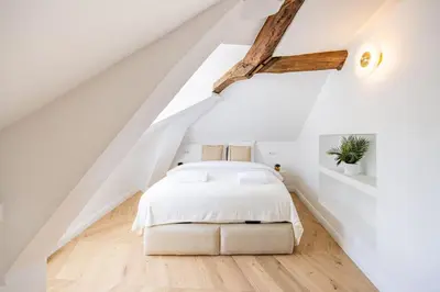 Un ou plusieurs lits dans un hébergement de l'établissement 3 bedrooms Sacrée cœur Place du Tertre Montmartre
