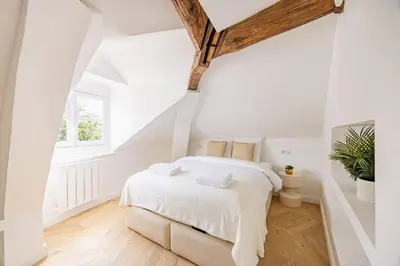 Un ou plusieurs lits dans un hébergement de l'établissement 3 bedrooms Sacrée cœur Place du Tertre Montmartre