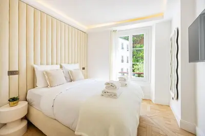 Un ou plusieurs lits dans un hébergement de l'établissement Townhouse Sacrée cœur Place du Tertre Montmartre