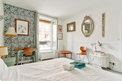 Un ou plusieurs lits dans un hébergement de l'établissement Charmant appartement proche du Canal de L'Ourcq