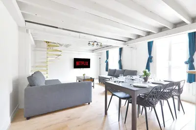 Coin salon dans l'établissement Appartement Quartier Place de la Bastille Free Netflix