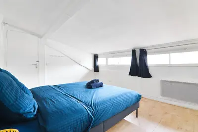 Coin salon dans l'établissement Appartement Quartier Place de la Bastille Free Netflix