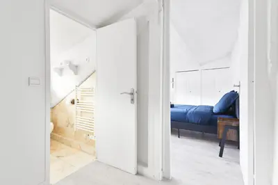 Coin salon dans l'établissement Appartement Quartier Place de la Bastille Free Netflix