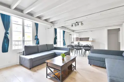 Coin salon dans l'établissement Appartement Quartier Place de la Bastille Free Netflix