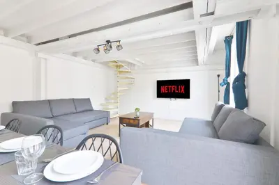 Coin salon dans l'établissement Appartement Quartier Place de la Bastille Free Netflix