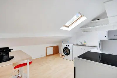 Cuisine ou kitchenette dans l'établissement MALAKOFF - Cosy apartment L002