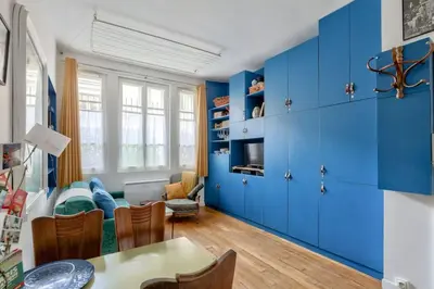 Télévision ou salle de divertissement dans l'établissement Cosy studio proche de la Basilique du Sacré-Coeur