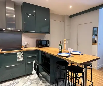 Cuisine ou kitchenette dans l'établissement calme et élégance