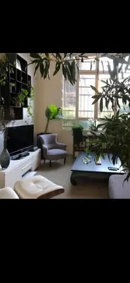 Coin salon dans l'établissement Appartement Loft centre ville