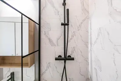 Salle de bains dans l'établissement GuestReady - Studio près de République pour Deux