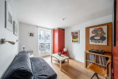 Coin salon dans l'établissement Appartement confortable centre de Paris