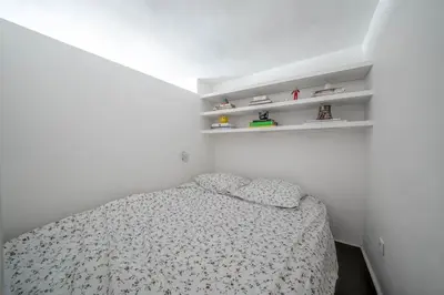 Un ou plusieurs lits dans un hébergement de l'établissement Appartement confortable centre de Paris