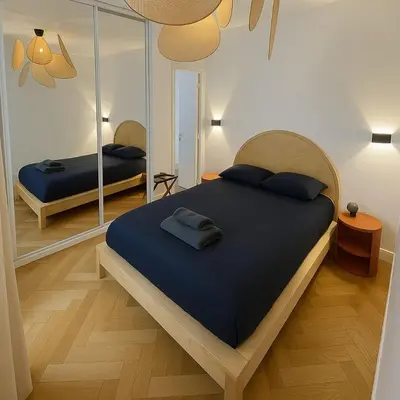 Un ou plusieurs lits dans un hébergement de l'établissement Exclusive Flat By Luxuio - Nearby Eiffel Tower