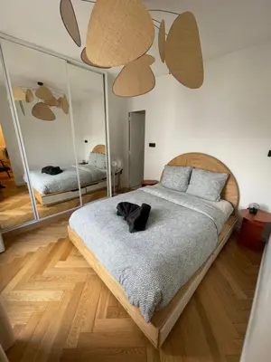 Un ou plusieurs lits dans un hébergement de l'établissement Exclusive Flat By Luxuio - Nearby Eiffel Tower