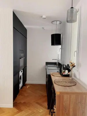 Cuisine ou kitchenette dans l'établissement Exclusive Flat By Luxuio - Nearby Eiffel Tower