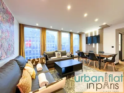 Coin salon dans l'établissement Urban Flat 129 - Sublime Art Love Champs-Elysees