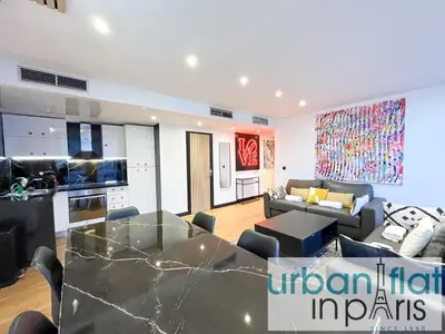 Coin salon dans l'établissement Urban Flat 129 - Sublime Art Love Champs-Elysees
