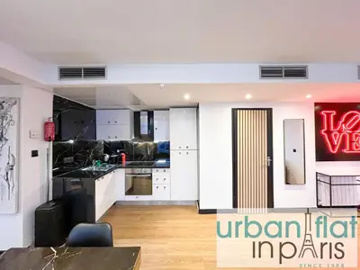 Cuisine ou kitchenette dans l'établissement Urban Flat 129 - Sublime Art Love Champs-Elysees