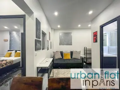 Un ou plusieurs lits dans un hébergement de l'établissement Urban Flat 189 - Atelier Montparnasse Vuitton
