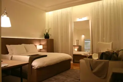 Un ou plusieurs lits dans un hébergement de l'établissement Cirque Deluxe Studio Apartment
