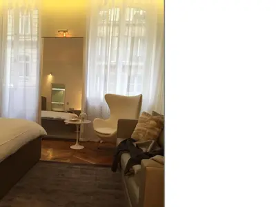 Coin salon dans l'établissement Cirque Deluxe Studio Apartment