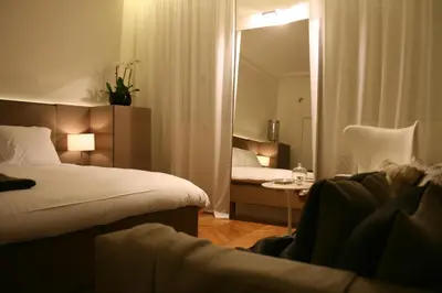 Un ou plusieurs lits dans un hébergement de l'établissement Cirque Deluxe Studio Apartment