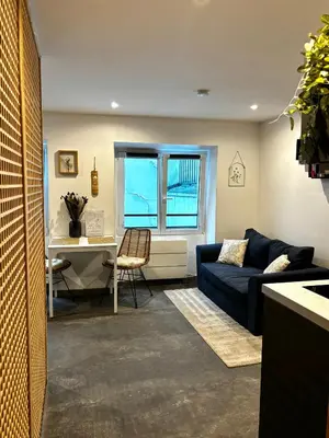 Coin salon dans l'établissement Studio moderne et cosy - Grand Rex