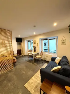 Coin salon dans l'établissement Studio moderne et cosy - Grand Rex