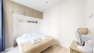 Un ou plusieurs lits dans un hébergement de l'établissement Bluestay 2 - Appartement au Cœur de Paris