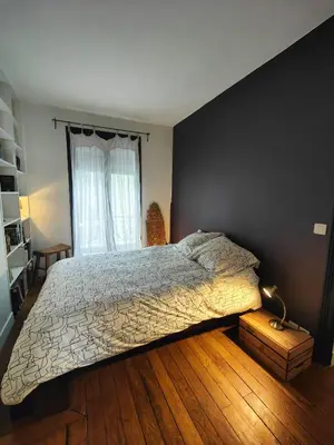 Un ou plusieurs lits dans un hébergement de l'établissement Beau 3 pièces près de Montmartre 1