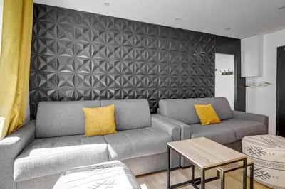 Coin salon dans l'établissement Bluestay 127 - Supebe Appartement au Cœur de Paris