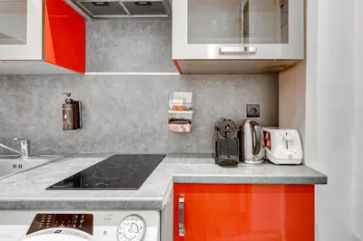 Cuisine ou kitchenette dans l'établissement Bluestay 222 - Appartement au centre de Paris