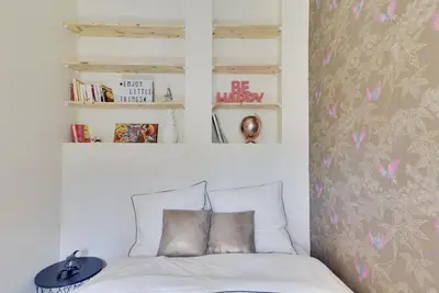 Un ou plusieurs lits dans un hébergement de l'établissement Bluestay 7 - Charmant appartement à Paris 15
