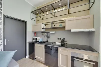 Cuisine ou kitchenette dans l'établissement Bluestay 7 - Charmant appartement à Paris 15