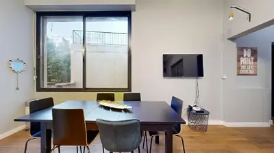 Télévision ou salle de divertissement dans l'établissement Bluestay 7 - Charmant appartement à Paris 15