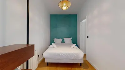 Un ou plusieurs lits dans un hébergement de l'établissement Bluestay 9 - Charmant appartement à Paris 11