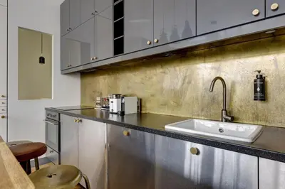 Cuisine ou kitchenette dans l'établissement Bluestay 19 - Charmant appartement à Paris 11