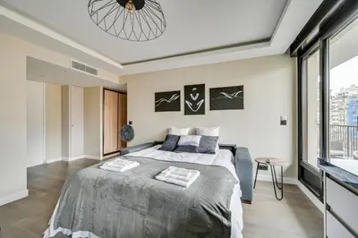 Un ou plusieurs lits dans un hébergement de l'établissement Bluestay 54 - Superbe appartement à Paris