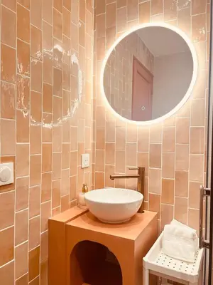 Salle de bains dans l'établissement Colisee
